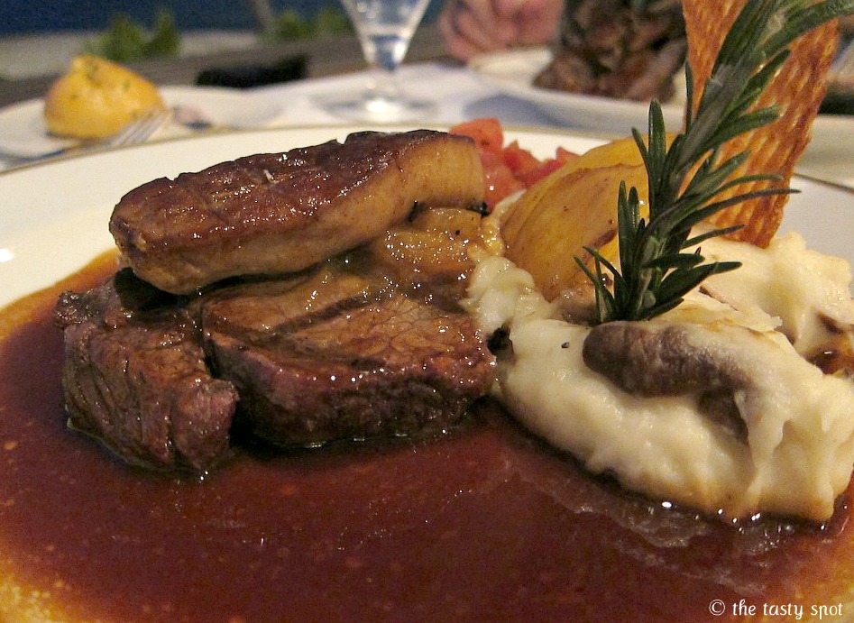 Foie gras laying on top of the tenderloin