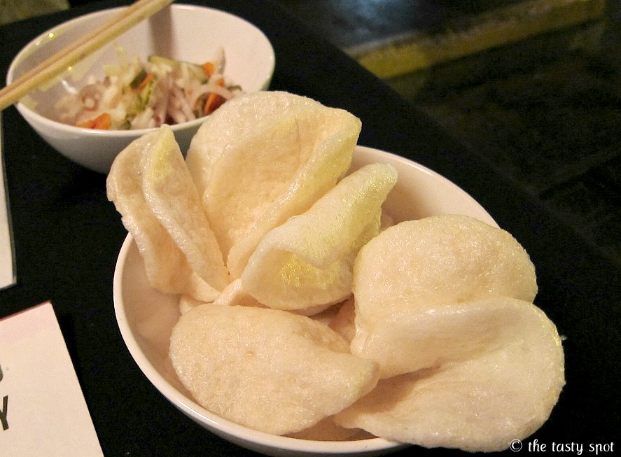 Shrimp chips with pickled radish and carrots