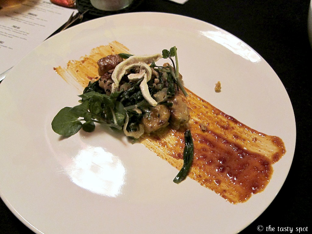 Gnocchi with kimchi, house cured bacon, crispy pig ears, and sesame leaves